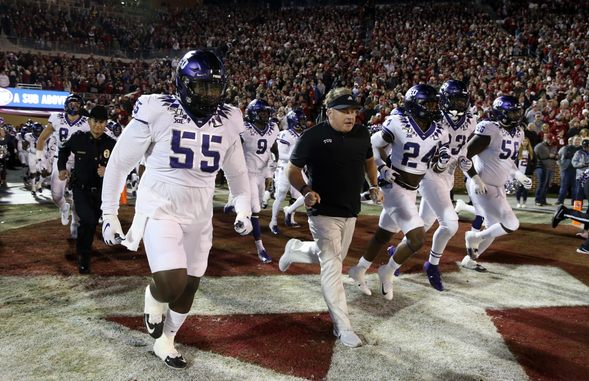 Nov 23, 2019; Norman, OK, USA; TCU Horned Frogs head coach Gary Patterson runs out with his team before the game against the Oklahoma Sooners at Gaylord Family - Oklahoma Memorial Stadium. Mandatory Credit: Kevin Jairaj-USA TODAY Sports