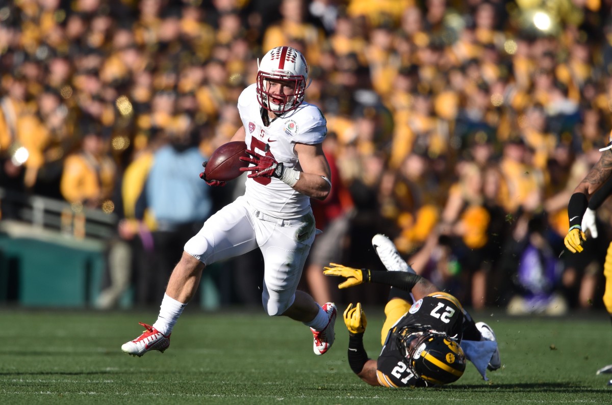 Jan 1, 2016; Pasadena, CA, USA; Stanford Cardinal running back Christian McCaffrey (5) runs against the Iowa Hawkeyes during the first quarter in the 2016 Rose Bowl at Rose Bowl. Mandatory Credit: Kirby Lee-USA TODAY Sports