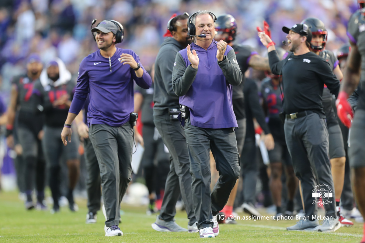 The TCU coaching staff is excited after the Frogs score against Baylor in Week 12. 