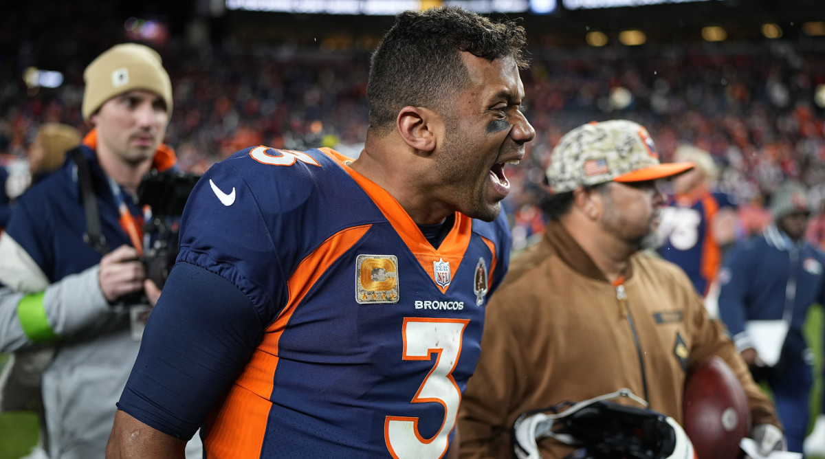 Broncos quarterback Russell Wilson celebrates after a win against the Vikings