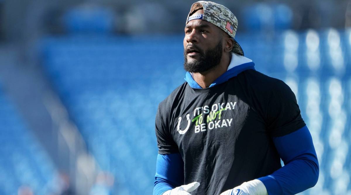 Colts linebacker Shaquille Leonard looks on while warming up before a game.