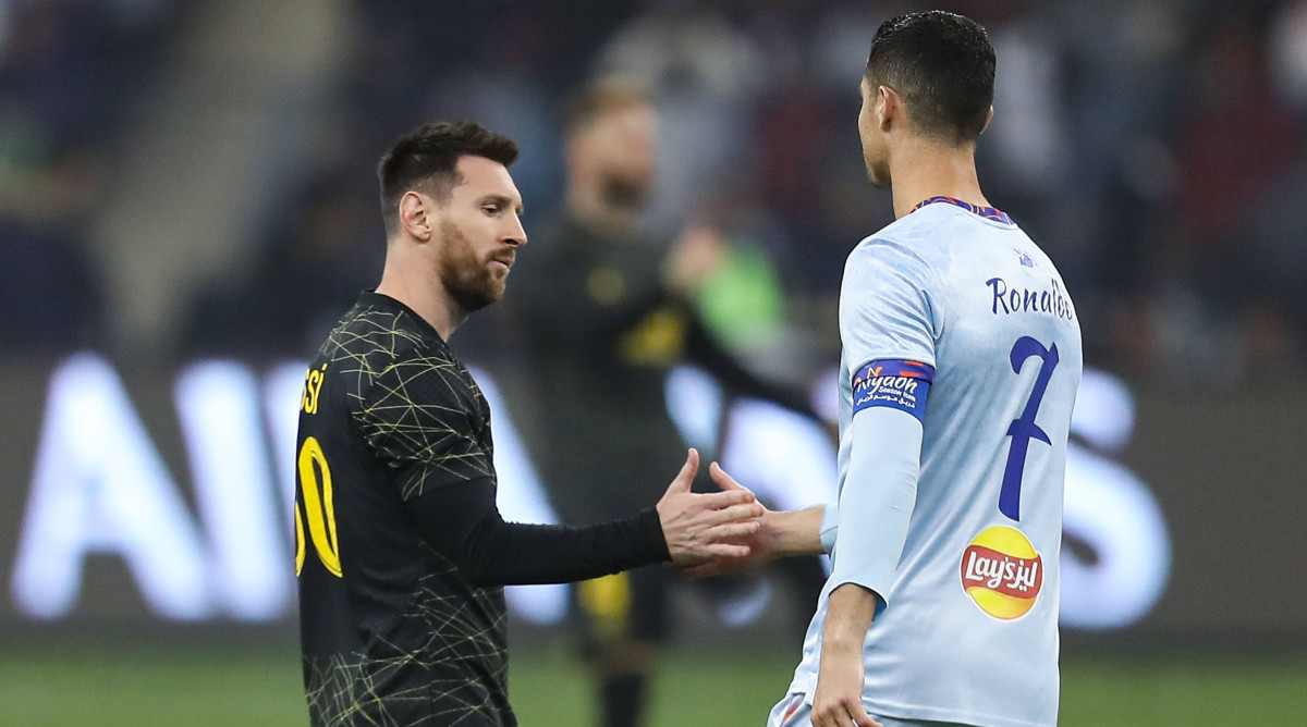 Lionel Messi greeting Cristiano Ronaldo