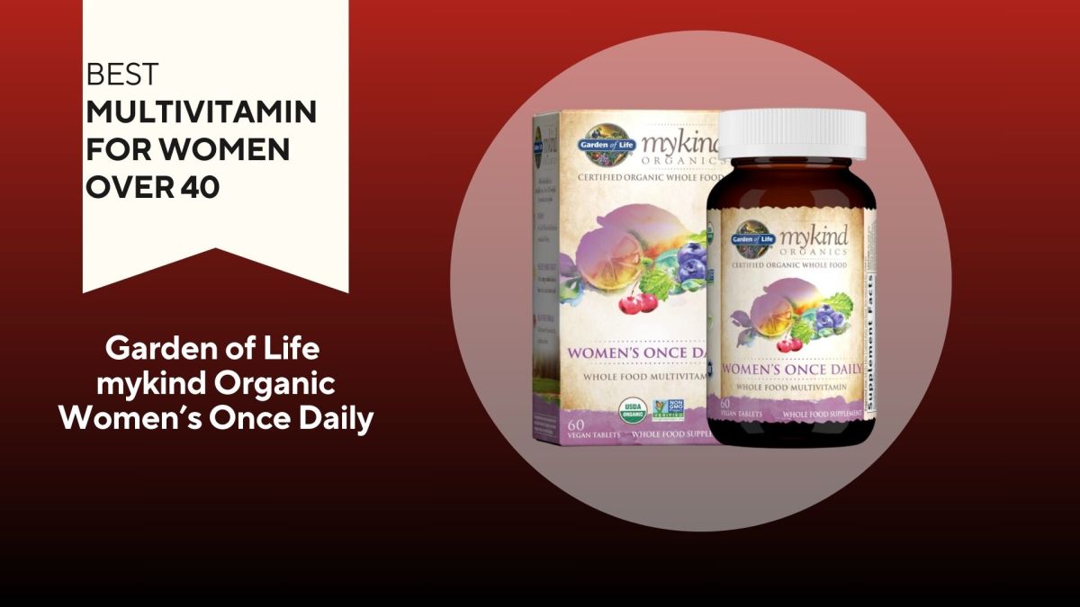A bottle of Garden of Life mykind Organic women's multivitamin against a red background