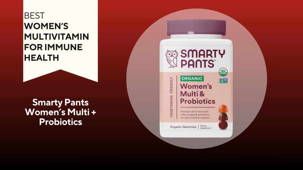 A bottle of SmartyPants women's multivitamin and probiotic gummy supplement against a red background