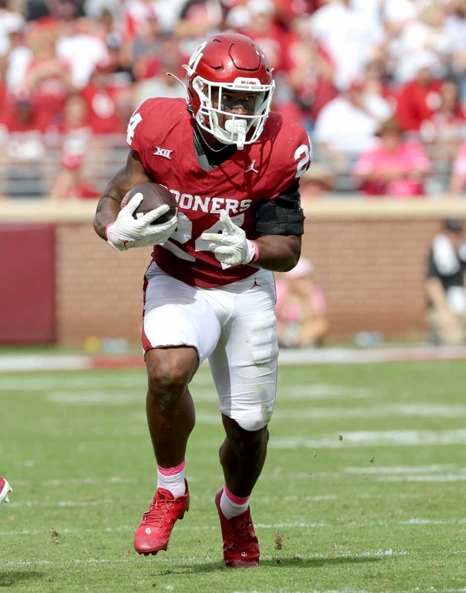 Oklahoma's Marcus Major (24) rushes in the second half of the college football game between the University of Oklahoma Sooners and the University of Central Florida Knights at Gaylord Family Oklahoma-Memorial Stadium in Norman, Okla., Saturday, Oct., 21, 2023.