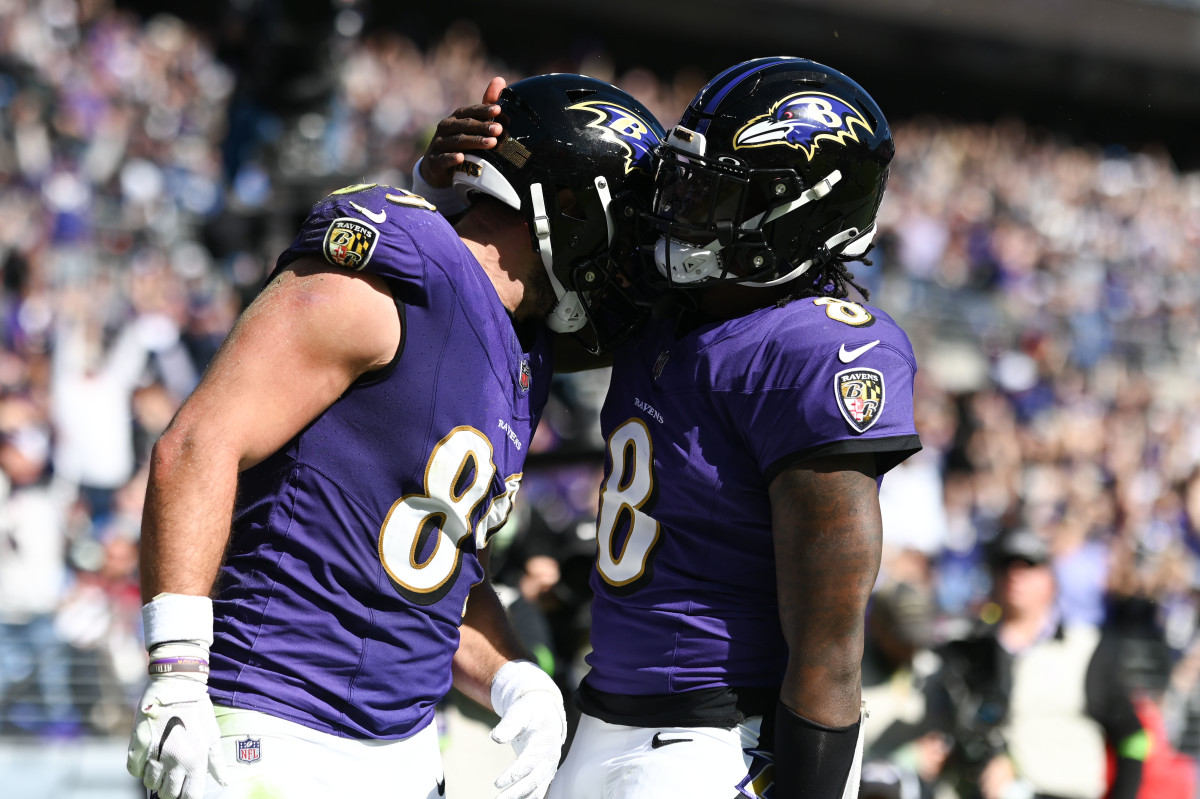Oct 22, 2023; Baltimore, Maryland, USA; Baltimore Ravens tight end Mark Andrews (89) celebrates with quarterback Lamar Jackson (8) after scoring a touchdown against the Detroit Lions at M&T Bank Stadium. 