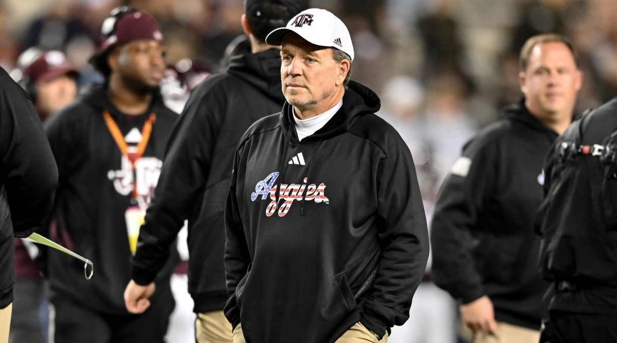 Texas A&M football coach Jimbo Fisher looks on during warm ups before a game against Mississippi State.
