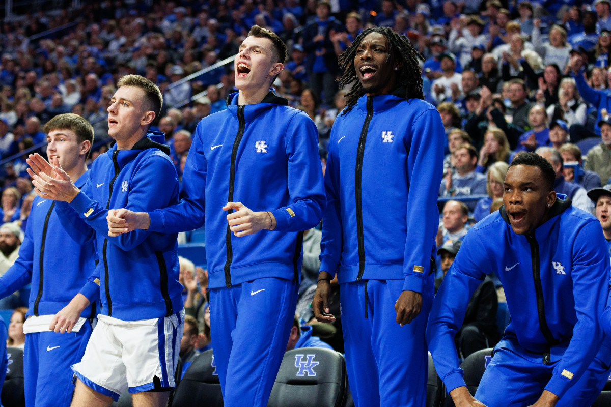 Nov 20, 2023; Lexington, Kentucky, USA; Kentucky Wildcats (from left to right) Brennan Canada, Zvonimir Ivisic, Aaron Bradshaw, and Ugonna Onyenso celebrate from the bench during the second half against the Saint Joseph's Hawks at Rupp Arena at Central Bank Center. Mandatory Credit: Jordan Prather-USA TODAY Sports