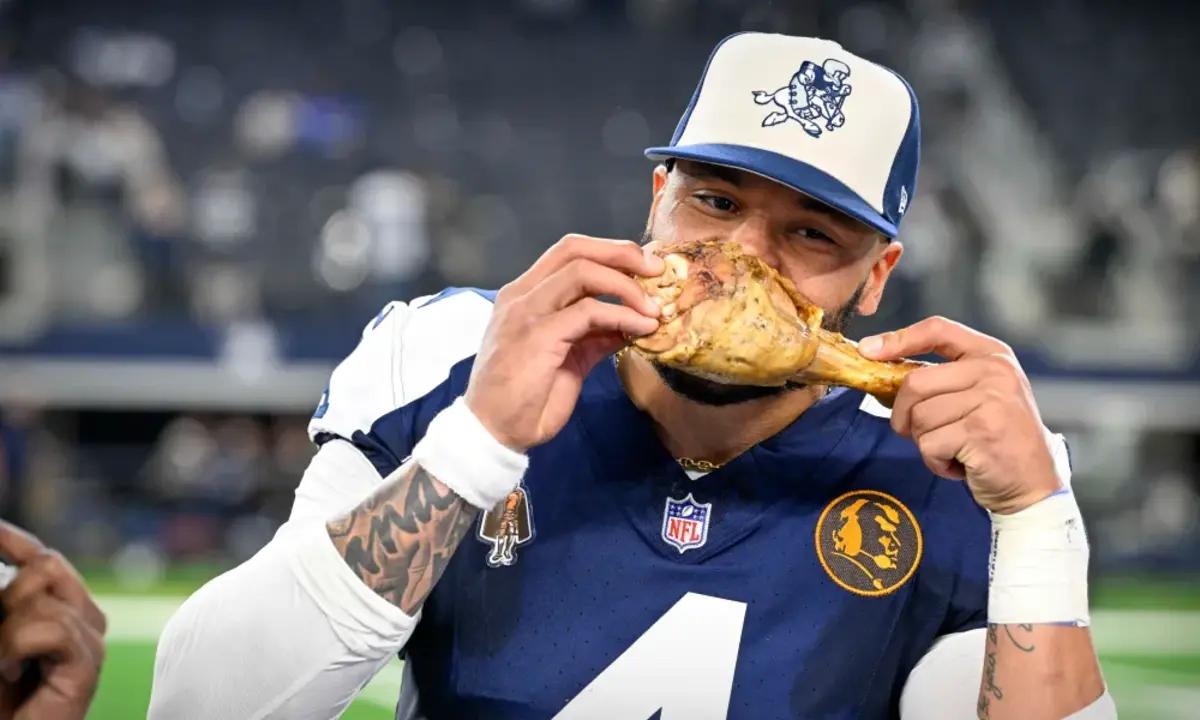 Prescott celebrates his Thanksgiving win with an iconic turkey leg.
