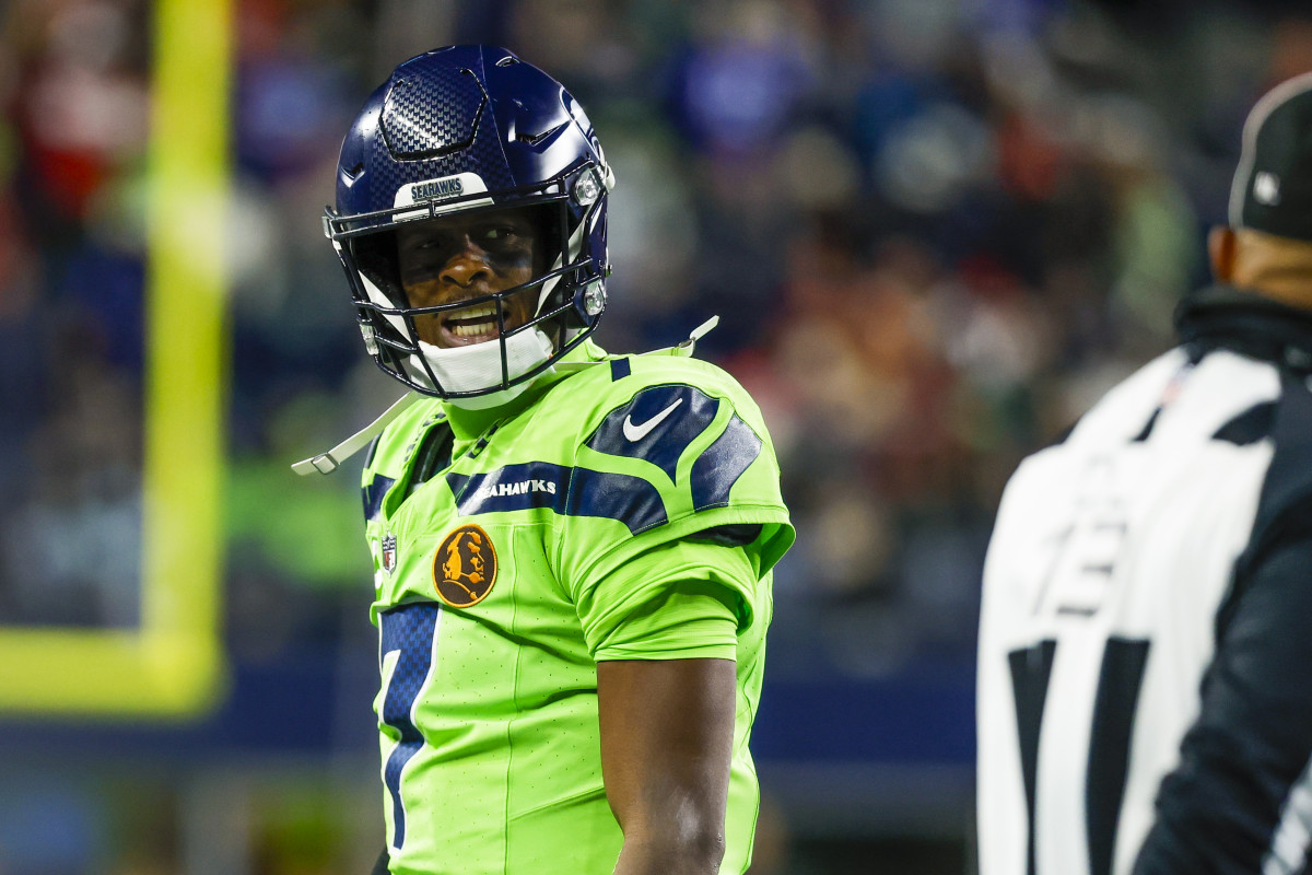 Seattle Seahawks quarterback Geno Smith (7) reacts towards a referee following a play against the San Francisco 49ers during the third quarter at Lumen Field.