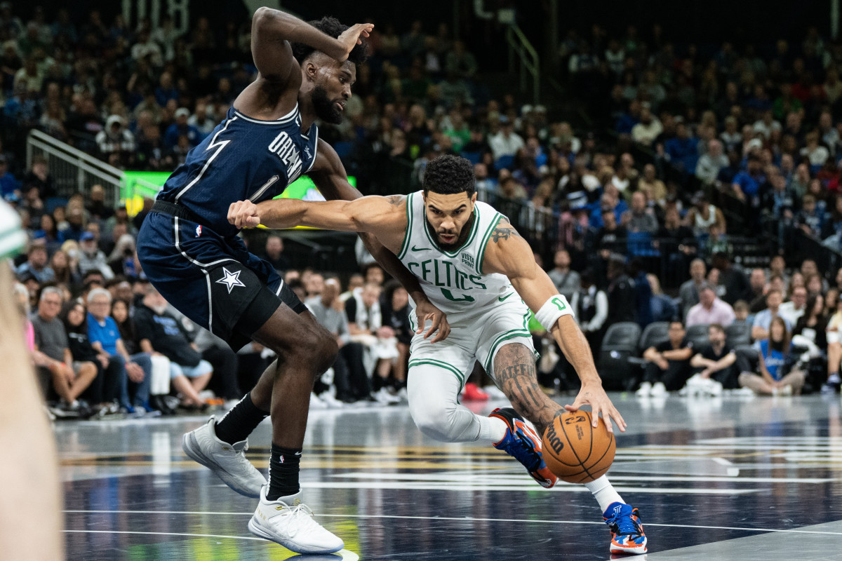Orlando Magic forward Jonathan Isaac defending Boston Celtics star Jayson Tatum