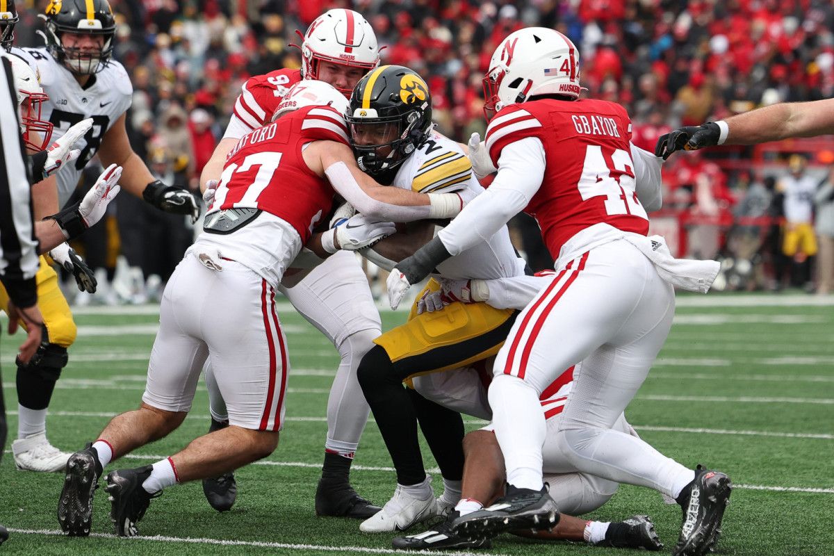 NU vs. Iowa 2023 - Phalen Sanford tackles Kaleb Johnson