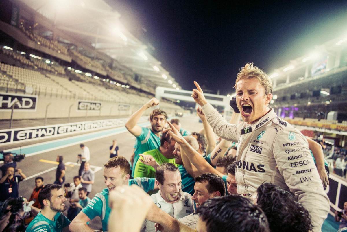 Nico Rosberg celebrates winning the F1 Driver's Championship with his team in 2016.
