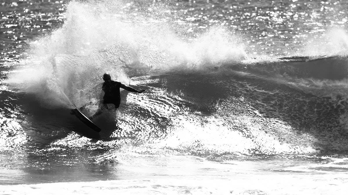 Kelly Slater riding the new Great White Twin model from Slater Designs