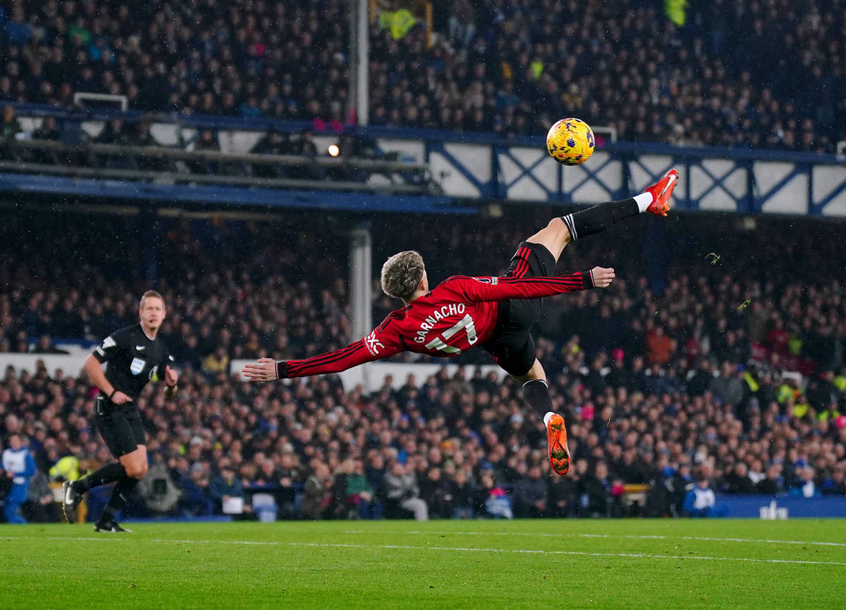 Alejandro Garnacho pictured performing a spectacular overhead kick to score for Manchester United in a 3-0 win at Everton in November 2023