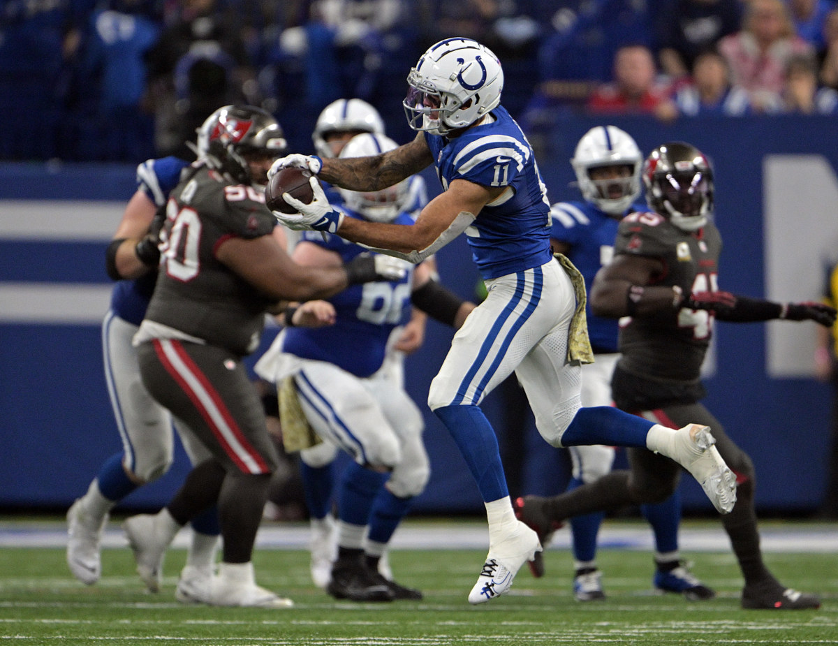 Nov 26, 2023; Indianapolis, Indiana, USA; Indianapolis Colts wide receiver Michael Pittman Jr. (11) catches a pass during the second half against the Tampa Bay Buccaneers at Lucas Oil Stadium.