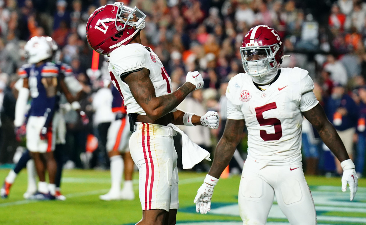 Alabama Crimson Tide wide receiver Isaiah Bond celebrates his game winning touchdown in the end zone during the fourth quarter against the Auburn Tigers at Jordan-Hare Stadium. Mandatory Credit: John David Mercer-USA TODAY Sports