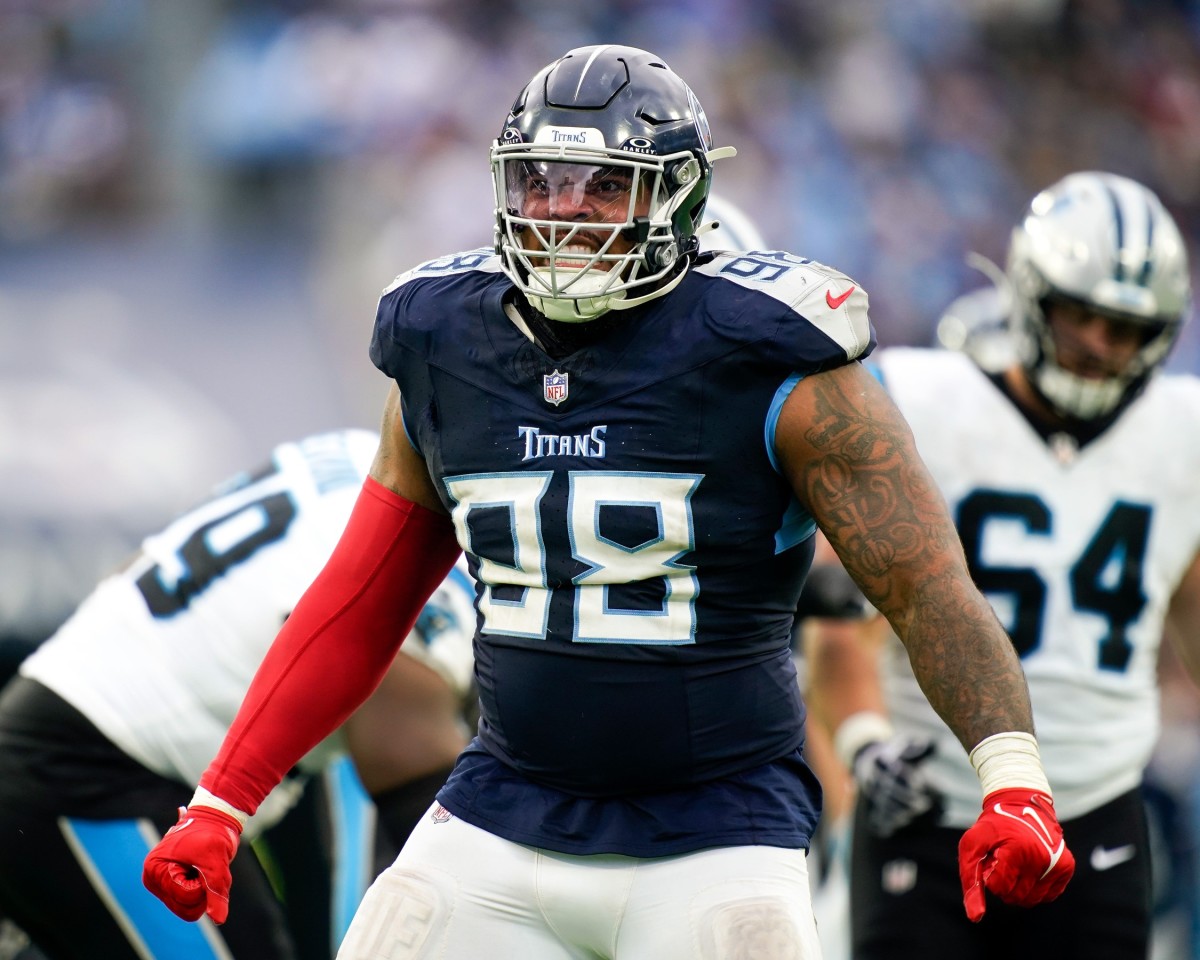 Tennessee Titans defensive tackle Jeffery Simmons (98) celebrates sacking Carolina Panthers quarterback Bryce Young during the third quarter at Nissan Stadium.