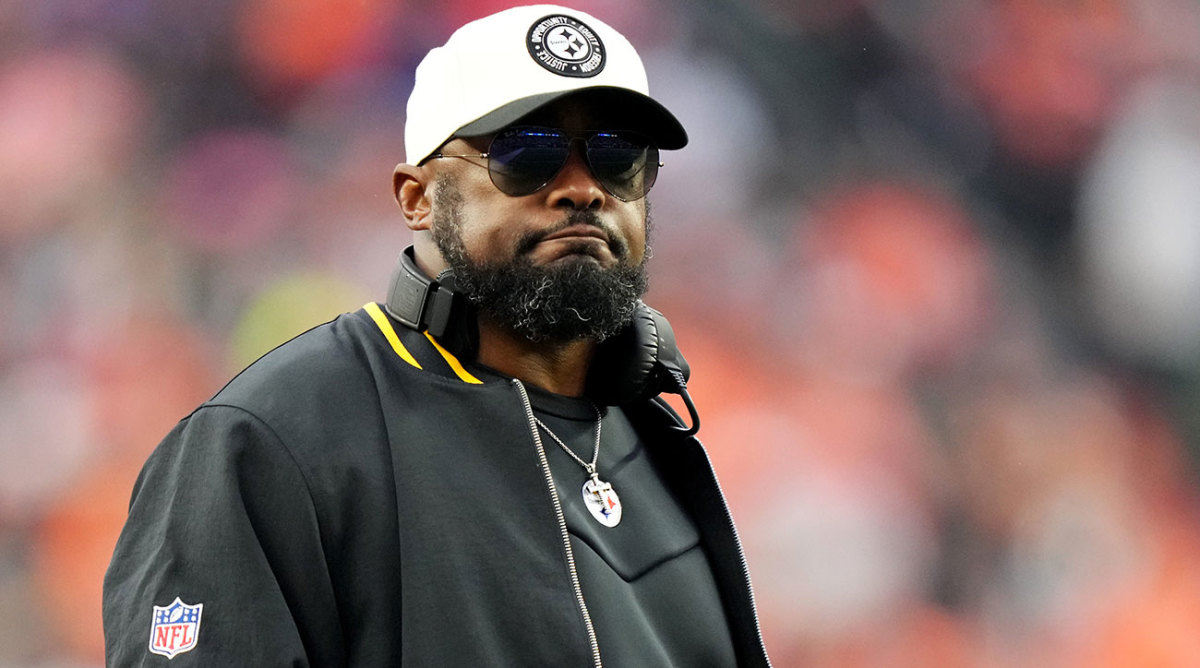 Mike Tomlin looks out at the field