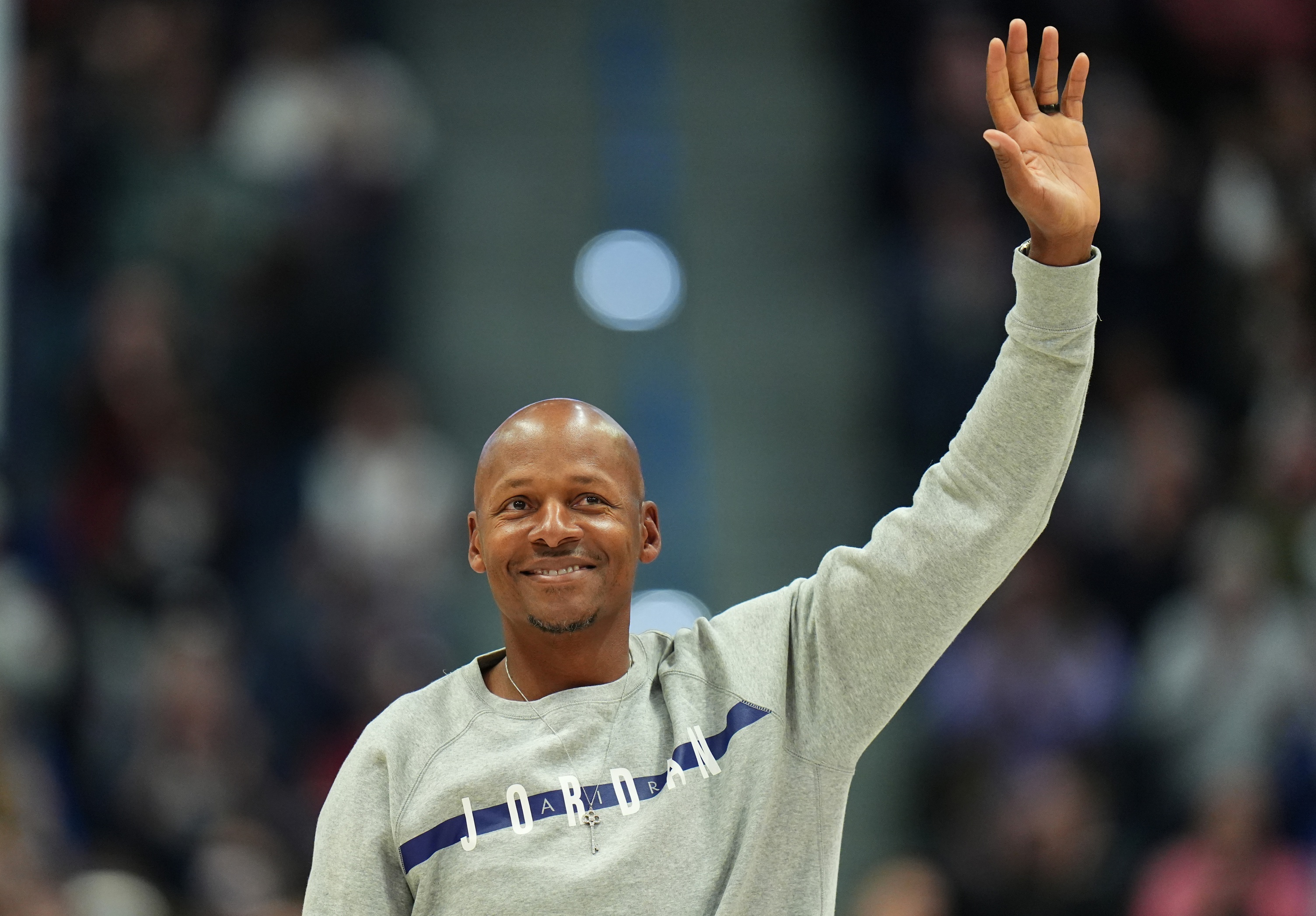 Former UConn Huskies and NBA player Ray Allen steps onto the court 