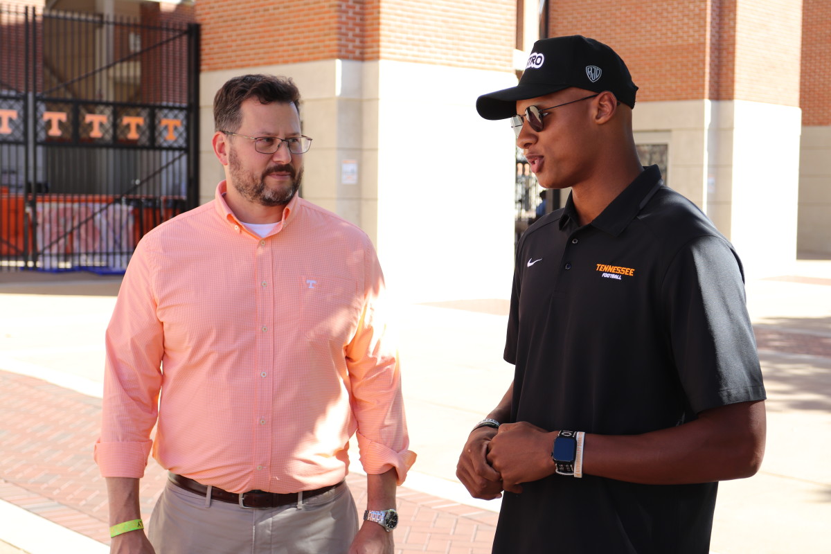 Joshua Dobbs talks to his former professor, Matthew Mench, on the Tennessee campus