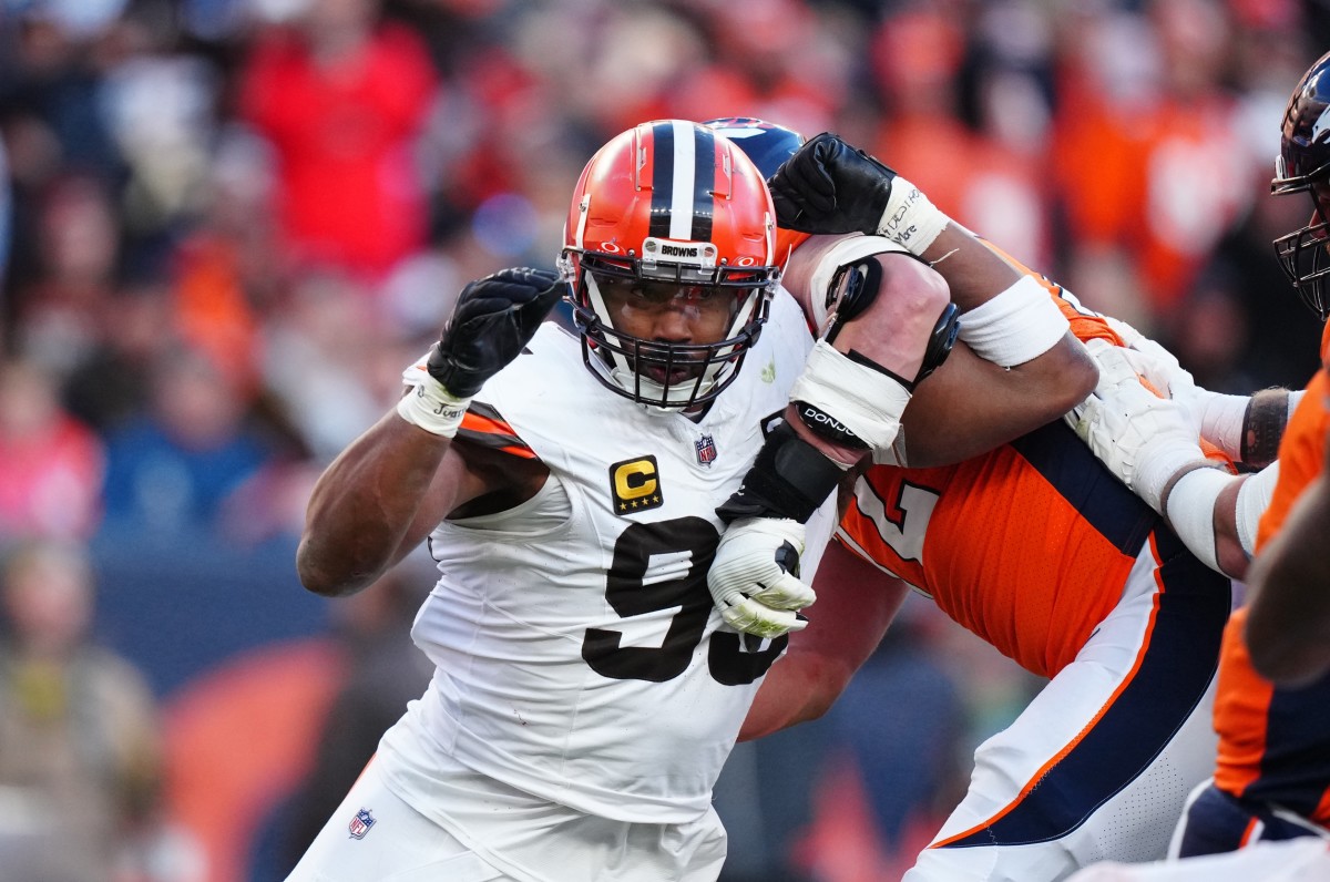 Nov 26, 2023; Denver, Colorado, USA; Cleveland Browns defensive end Myles Garrett (95) rushes past Denver Broncos offensive tackle Garett Bolles (72) in the first half at Empower Field at Mile High. Mandatory Credit: Ron Chenoy-USA TODAY Sports