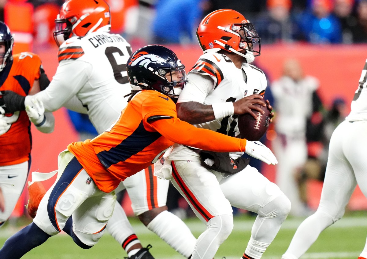 Denver Broncos safety P.J. Locke (6) sacks Cleveland Browns quarterback PJ Walker (10) in the fourth quarter at Empower Field at Mile High.