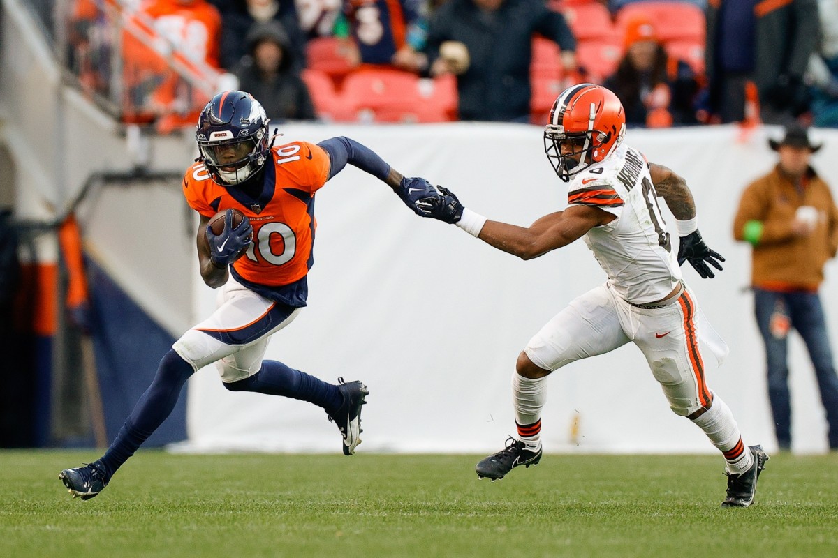 Denver Broncos wide receiver Jerry Jeudy (10) runs the ball against Cleveland Browns cornerback Greg Newsome II (0) in the third quarter at Empower Field at Mile High.