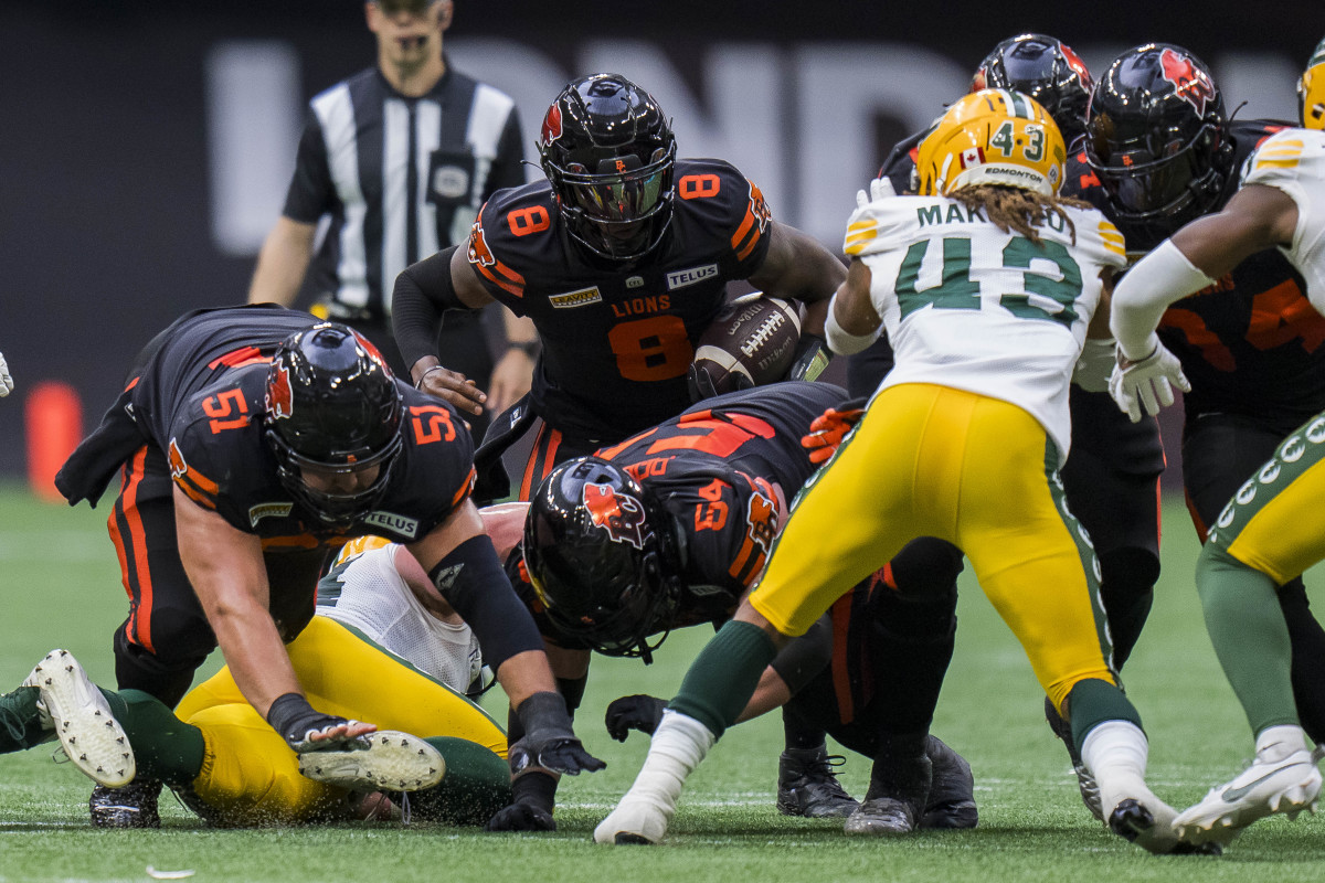 BC Lions quarterback Dominique Davis (8) carries the ball against the Edmonton Elks in the second half at BC Place. BC won 22-0.