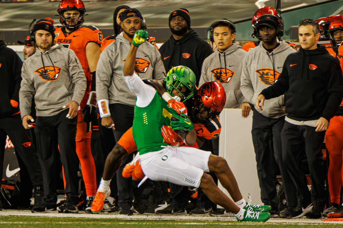 Oregon Ducks wide receiver Gary Bryant Jr. is tackled during a game against the Oregon State Beavers.