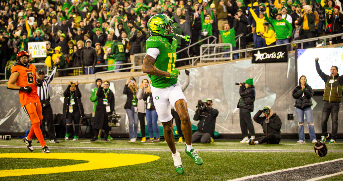 Oregon Ducks wide receiver Troy Franklin celebrates a touchdown against the Oregon State Beavers.