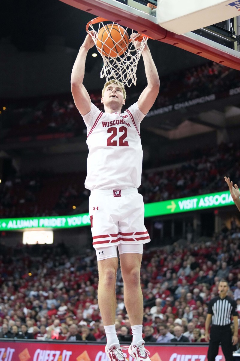 Nov 27, 2023; Madison, Wisconsin, USA; Wisconsin Badgers forward Steven Crowl (22) dunks the bal during the second half against the Western Illinois Leathernecks at the Kohl Center. Mandatory Credit: Kayla Wolf-USA TODAY Sports