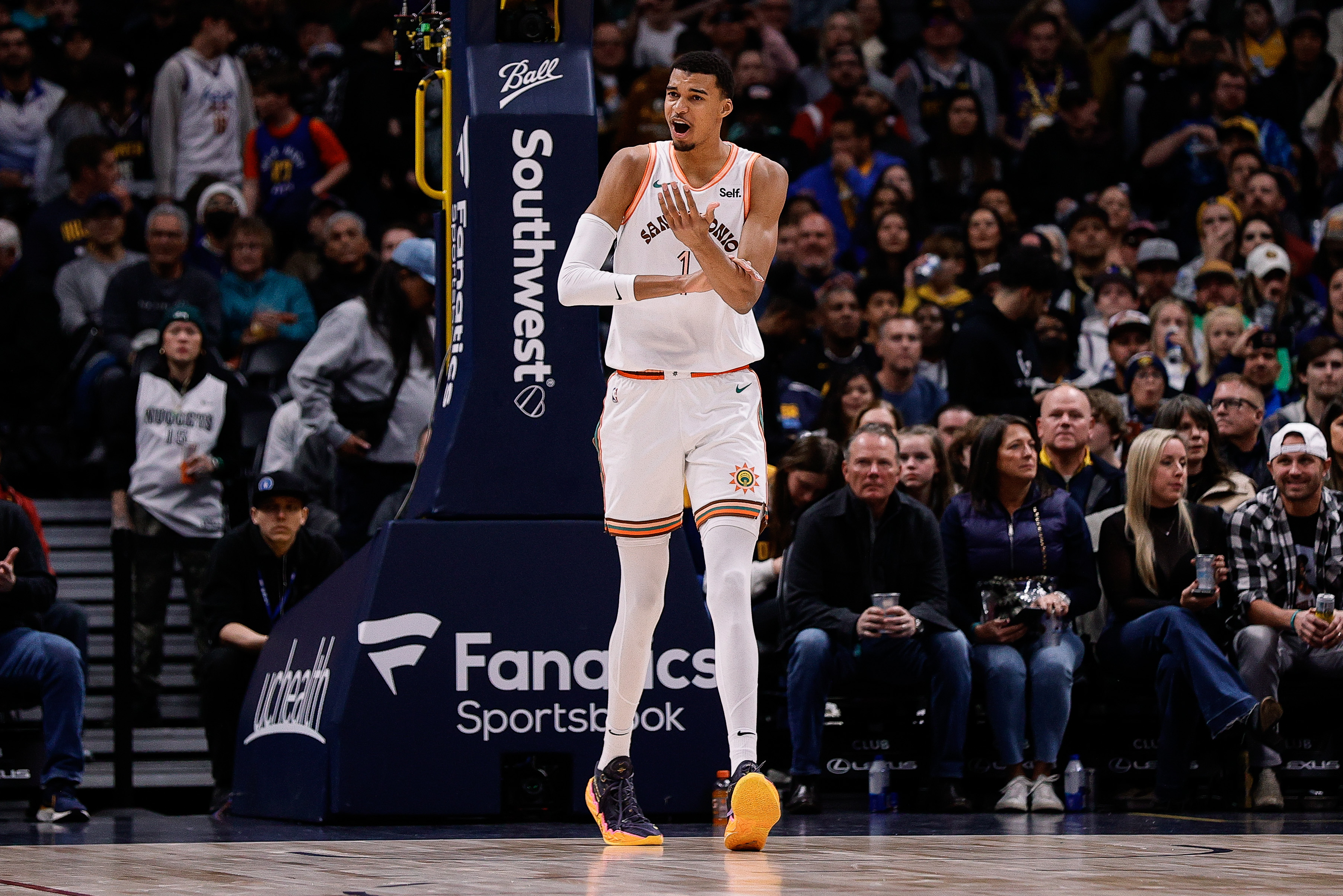 Nov 26, 2023; Denver, Colorado, USA; San Antonio Spurs center Victor Wembanyama (1) reacts after a play in the first quarter against the Denver Nuggets at Ball Arena.