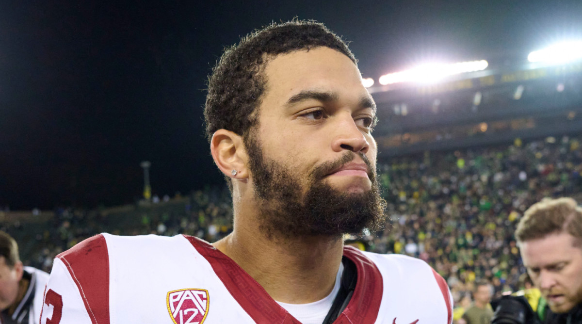 USC quarterback Caleb Williams walks off the field following a loss.