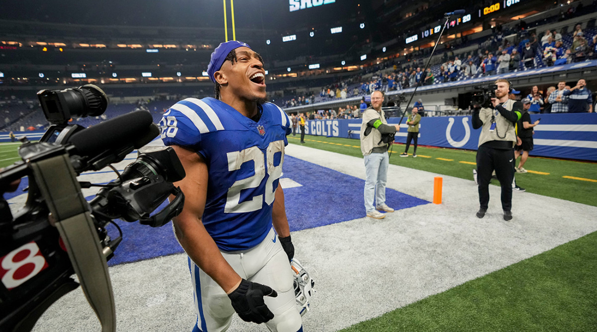 Colts running back Jonathan Taylor (28) celebrates as he leaves the field Sunday, Nov. 26, 2023, after defeating the Buccaneers at Lucas Oil Stadium in Indianapolis.