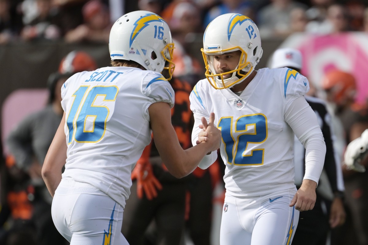 Oct 9, 2022; Los Angeles Chargers kicker Taylor Bertolet (12) and holder JK Scott (16) celebrate after a field goal against the Cleveland Browns. Mandatory Credit: Ken Blaze-USA TODAY Sports