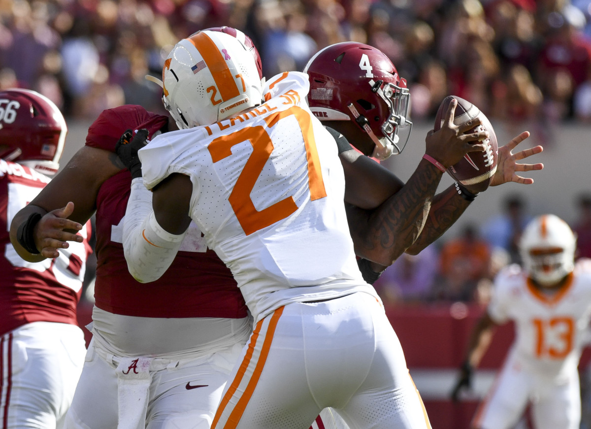 Tennessee Volunteers EDGE James Pearce Jr. forcing a fumble during the loss to Alabama. (Photo by Gary Cosby Jr. of USA Today Sports)