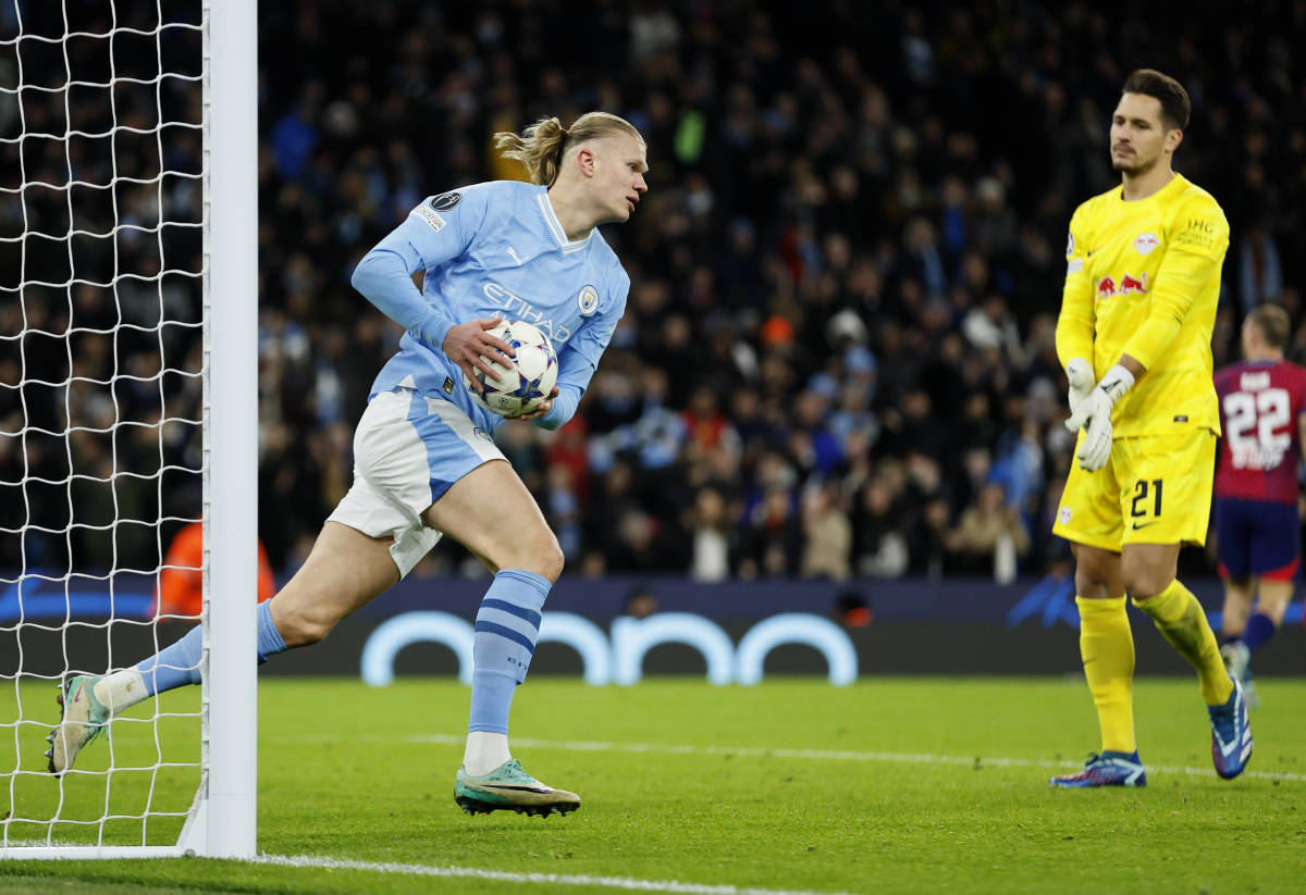 Erling Haaland pictured (left) moments after scoring for Manchester City in a 3-2 win over RB Leipzig in November 2023