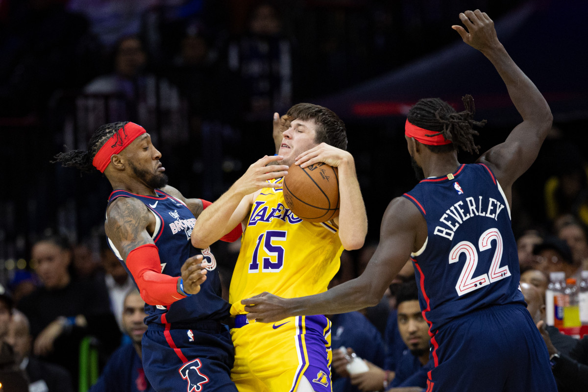 Philadelphia 76ers guard Patrick Beverley and forward Robert Covington defend against Los Angeles Lakers guard Austin Reaves during the third quarter at Wells Fargo Center.
