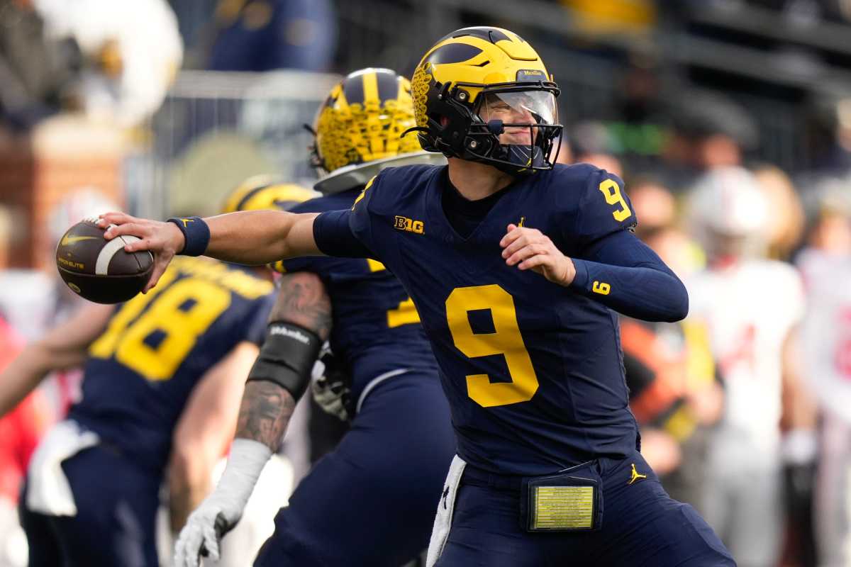 Nov 25, 2023; Ann Arbor, Michigan, USA; Michigan Wolverines quarterback J.J. McCarthy (9) throws during the second half of the NCAA football game against the Ohio State Buckeyes at Michigan Stadium. Ohio State lost 30-24