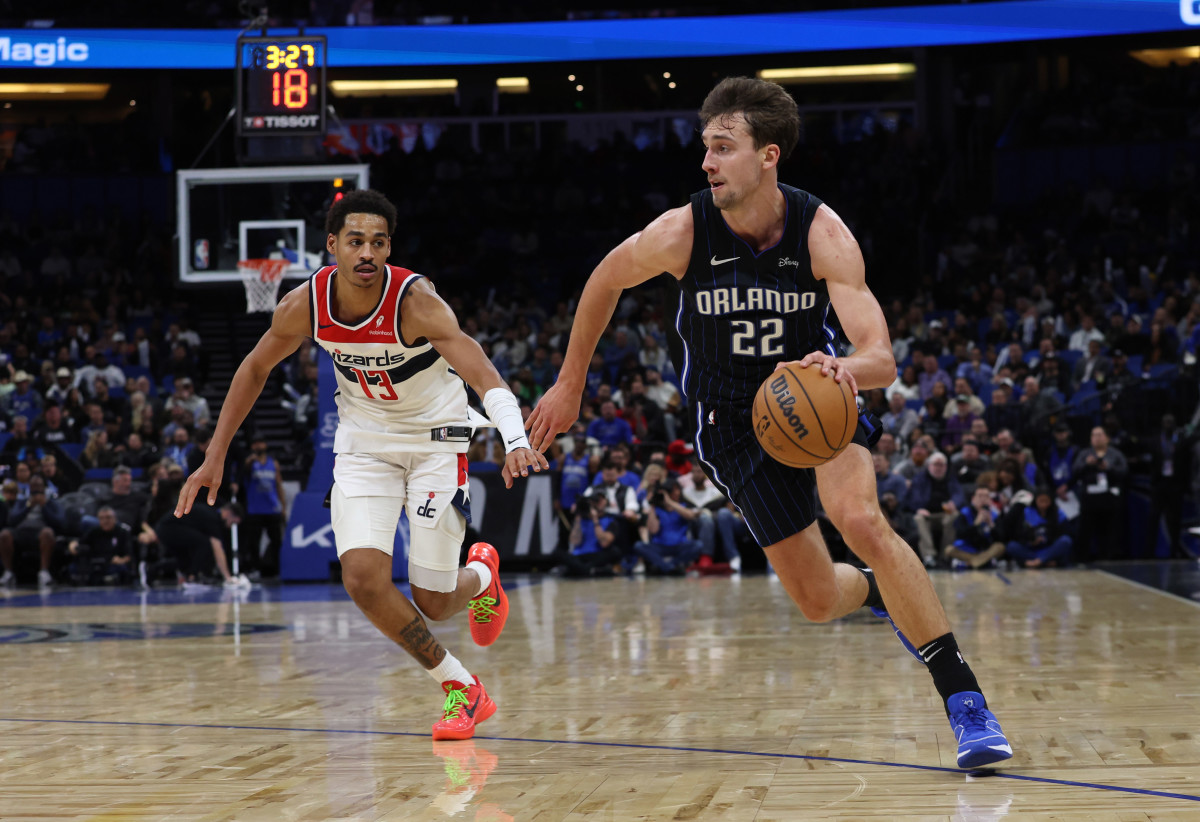 Orlando Magic forward Franz Wagner (22) drives to the basket as Washington Wizards guard Jordan Poole (13) defends during the second quarter at Amway Center.