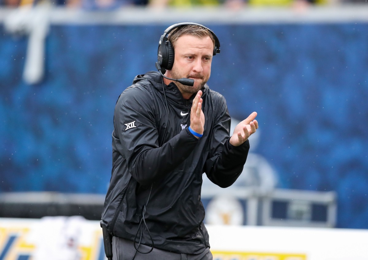 Former WVU OC Jake Spavital Hired by Big 12 Rival Sports Illustrated