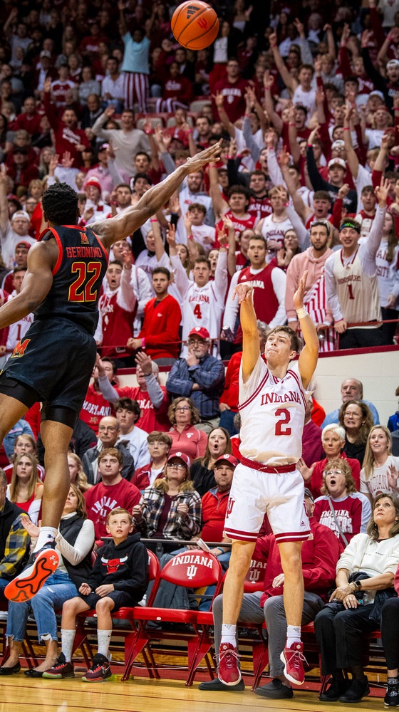 Indiana University's Gabe Cupps (2) shoots a three-pointer over Maryland's Jordan Geronimo (22) during the first half of the Indiana versus Maryland men's basketball game.
