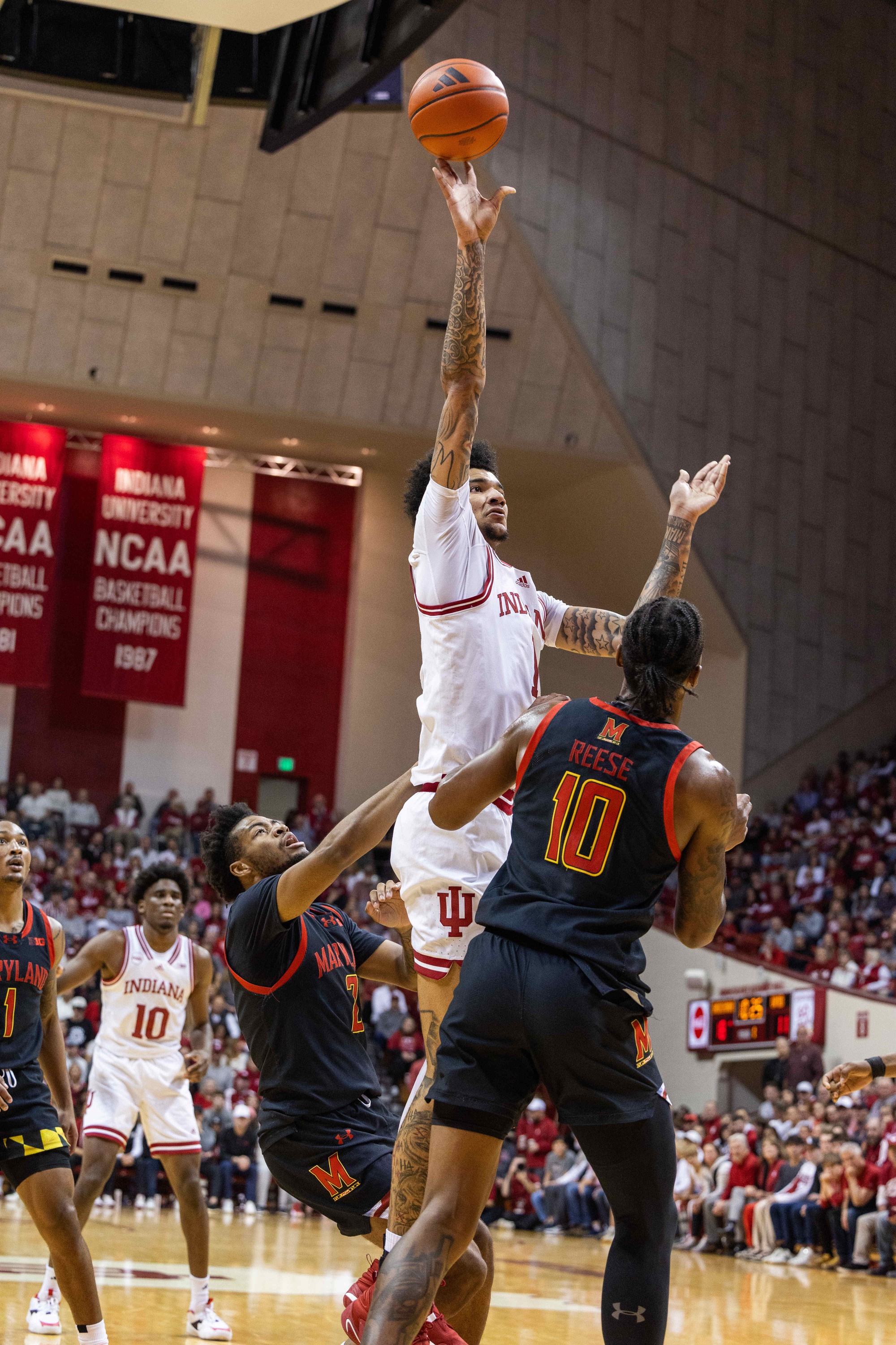  Indiana Hoosiers center Kel'el Ware (1) shoots the ball while Maryland Terrapins forward Julian Reese (10) defends in the first half at Simon Skjodt Assembly Hall.