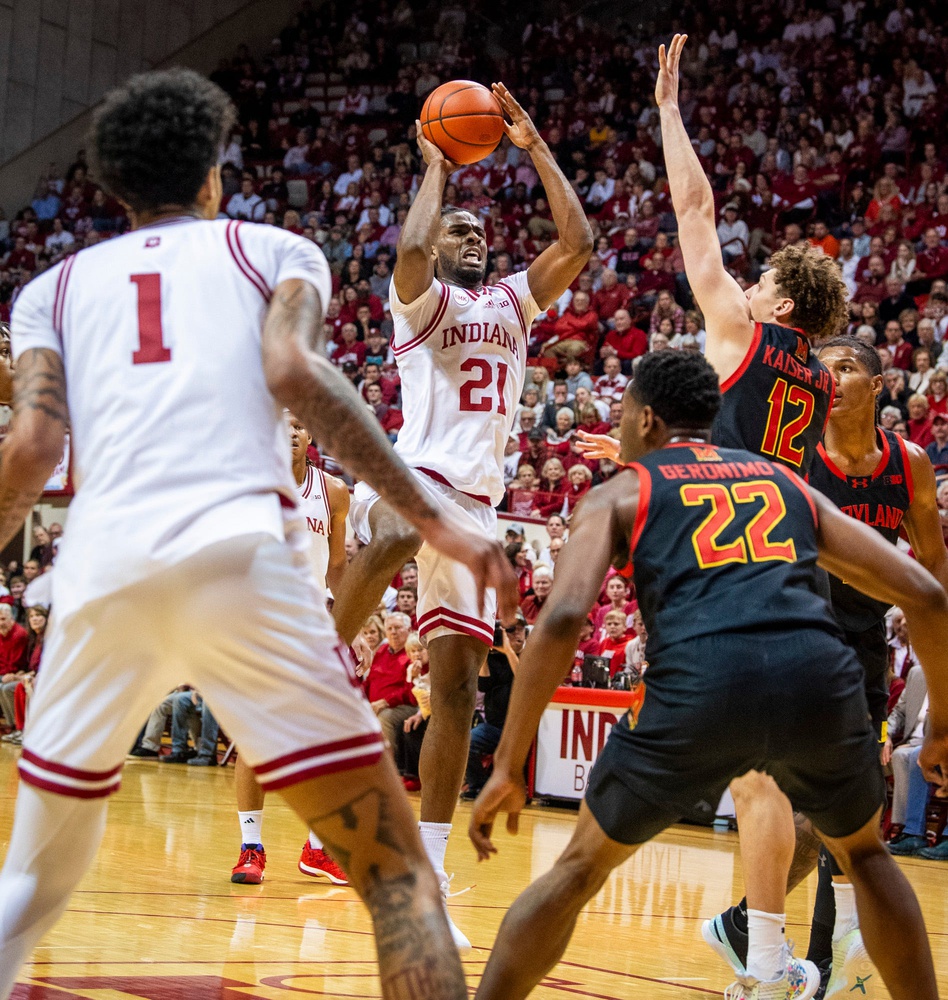 Indiana Hoosiers forward Mackenzie Mgbako shoots past Maryland's defense during the first half of the Indiana versus Maryland game.