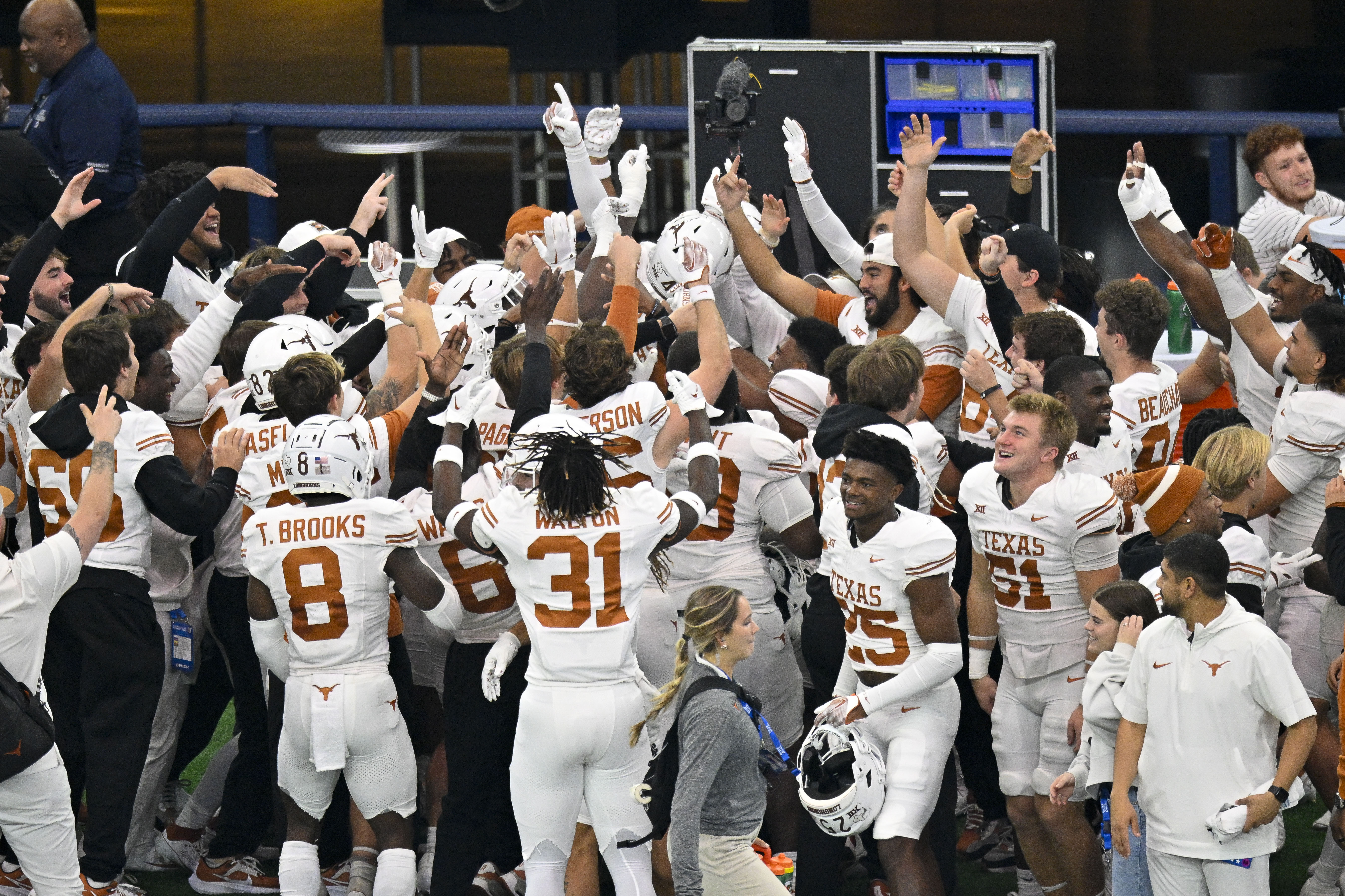 Texas Longhorns celebrate their domination of Oklahoma State in Arlington