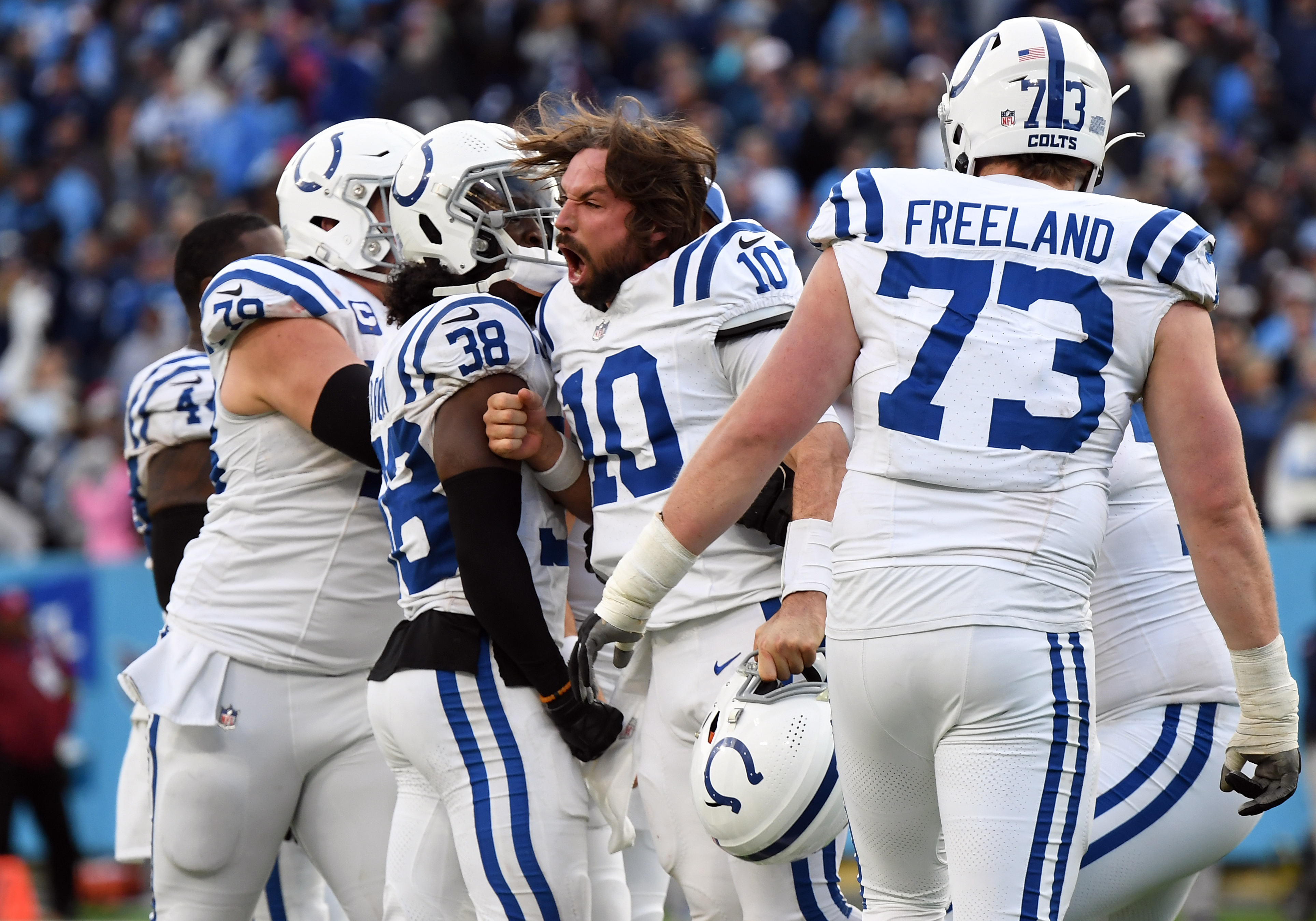 Dec 3, 2023; Nashville, Tennessee, USA; Indianapolis Colts quarterback Gardner Minshew (10) celebrates with teammates after throwing the game-winning touchdown to beat the Tennessee Titans at Nissan Stadium.