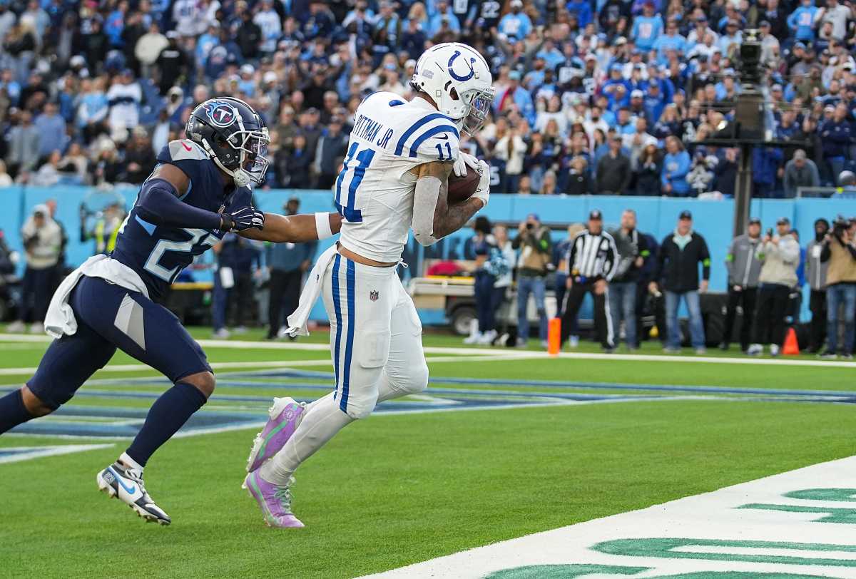 Indianapolis Colts wide receiver Michael Pittman Jr. (11) runs in the game-winning touchdown in overtime against the Tennessee Titans on Sunday, Dec. 3, 2023, at Nissan Stadium in Nashville, Tenn. The final score was 31-28.