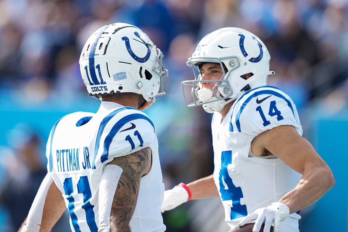 Indianapolis Colts wide receiver Michael Pittman Jr. (11) and wide receiver Alec Pierce (14) celebrate a touchdown by Pierce on Sunday, Dec. 3, 2023, during a game against the Tennessee Titans at Nissan Stadium in Nashville, Tenn.  