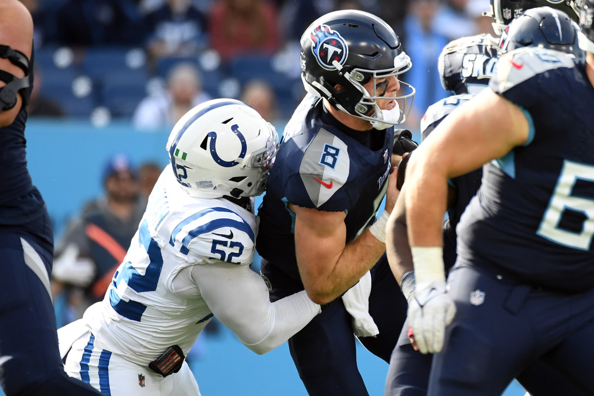Dec 3, 2023; Nashville, Tennessee, USA; Tennessee Titans quarterback Will Levis (8) is sacked by Indianapolis Colts defensive end Samson Ebukam (52) during the first half at Nissan Stadium.